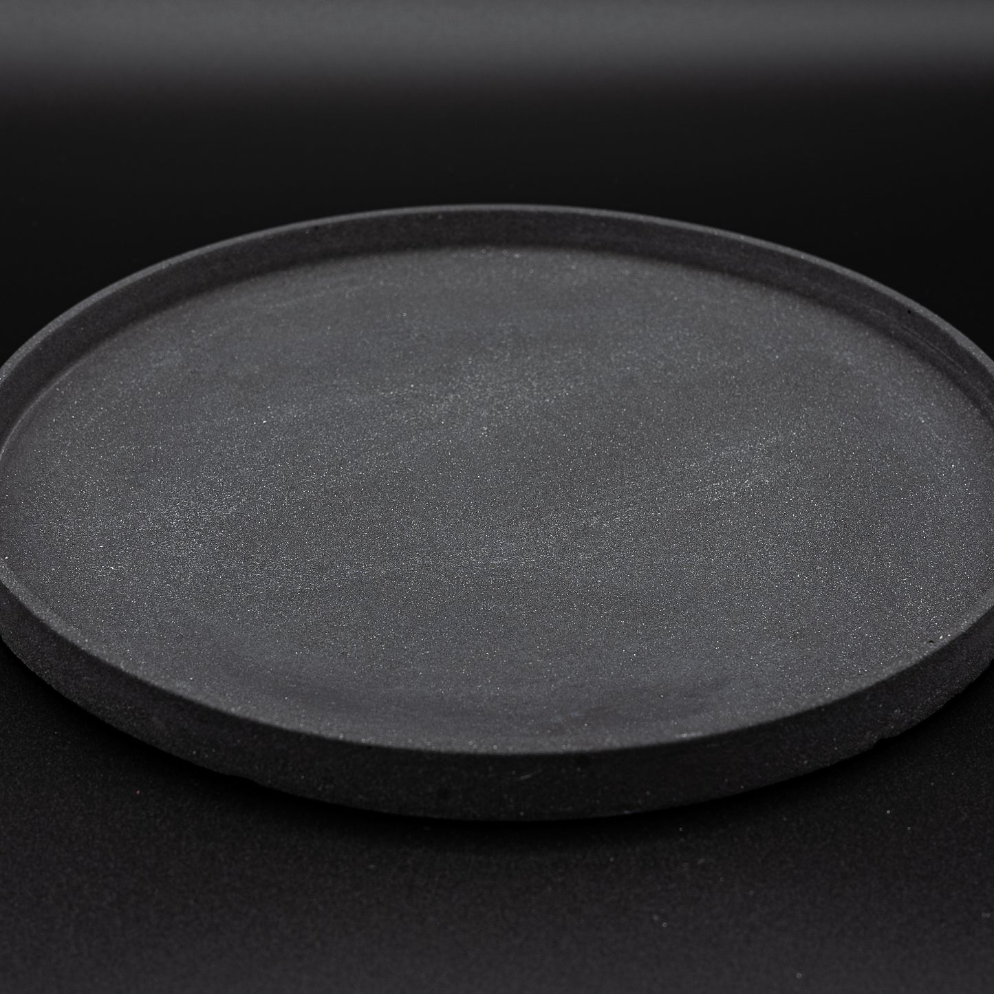 Svuotatasche effetto pietra nero